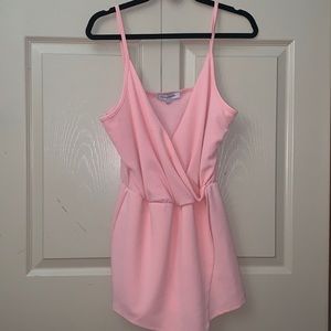 Romper with skirt flap in front